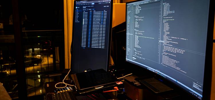 A developer at a workstation with code on screen, surrounded by a digital abstract of security locks and server racks—illustrating modern password hashing