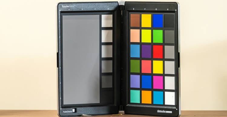 A designer examines color combinations for accessibility on a modern computer screen