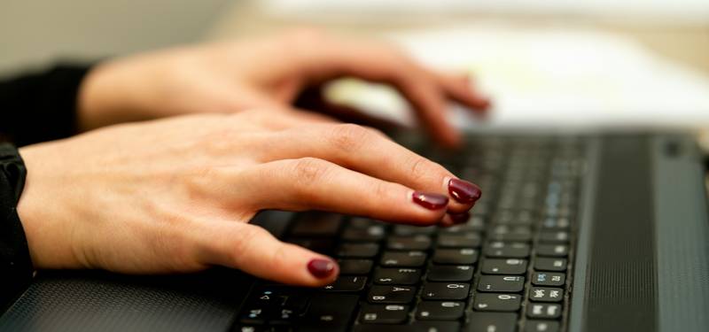 A person at a computer submitting a data rights request form online