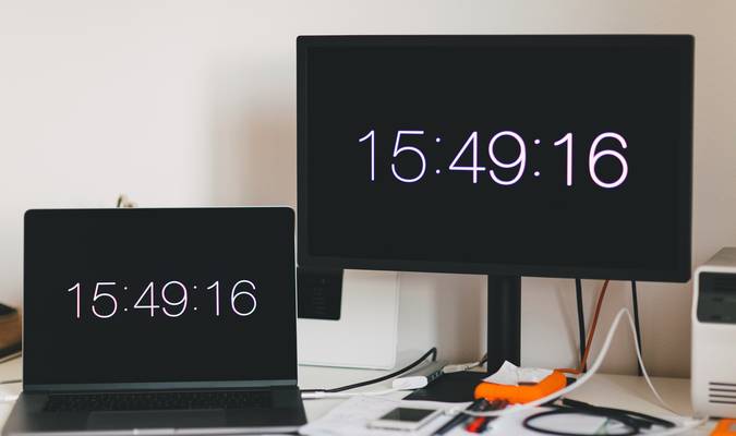 A developer working with code and abstract time data, illustrating timestamp generation and conversion