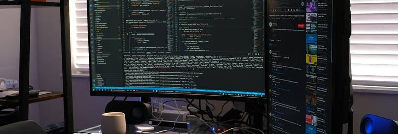 A modern workspace showing a developer converting data between encoding formats on screen