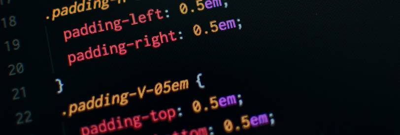 Web developer troubleshooting character encoding errors using browser tools and code editor