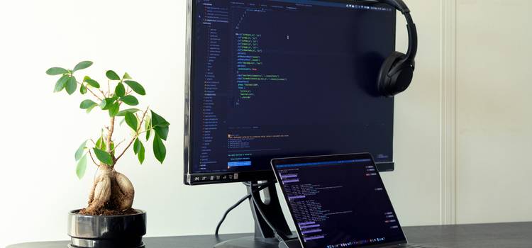 Developer working on clean HTML code in a modern workspace