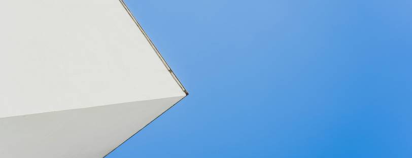 A modern HTML email signature example shown on a laptop, representing professional branding