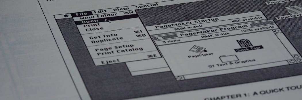 A laptop displaying a markdown editor next to a Word document, symbolizing seamless markdown to DOCX conversion