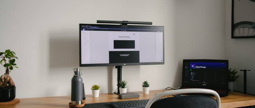 A modern workspace showing markdown on a screen and a PDF export side-by-side