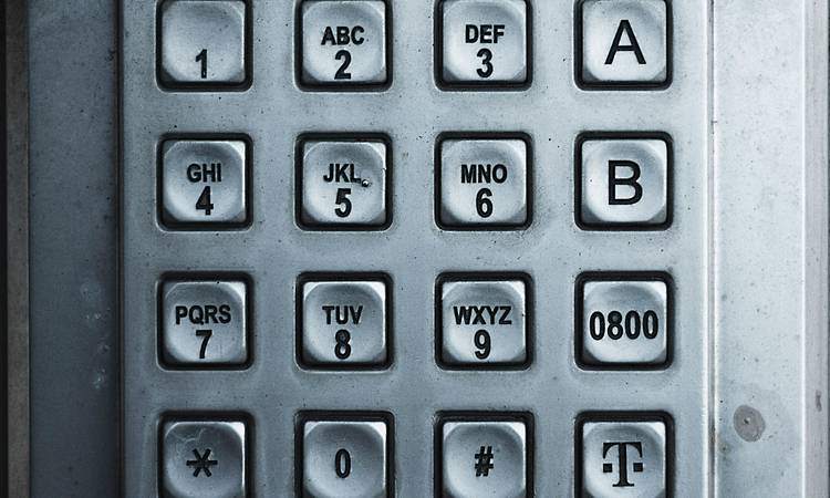 A close-up of a computer screen with a password input field, a digital lock icon, and code in the background, symbolizing password security