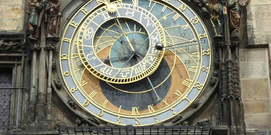 A collage of world clocks and digital time displays showing different cities, suggesting global time zone lookup