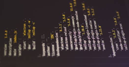 A conceptual photo showing XML and JSON code on screens, illustrating data transformation for web APIs